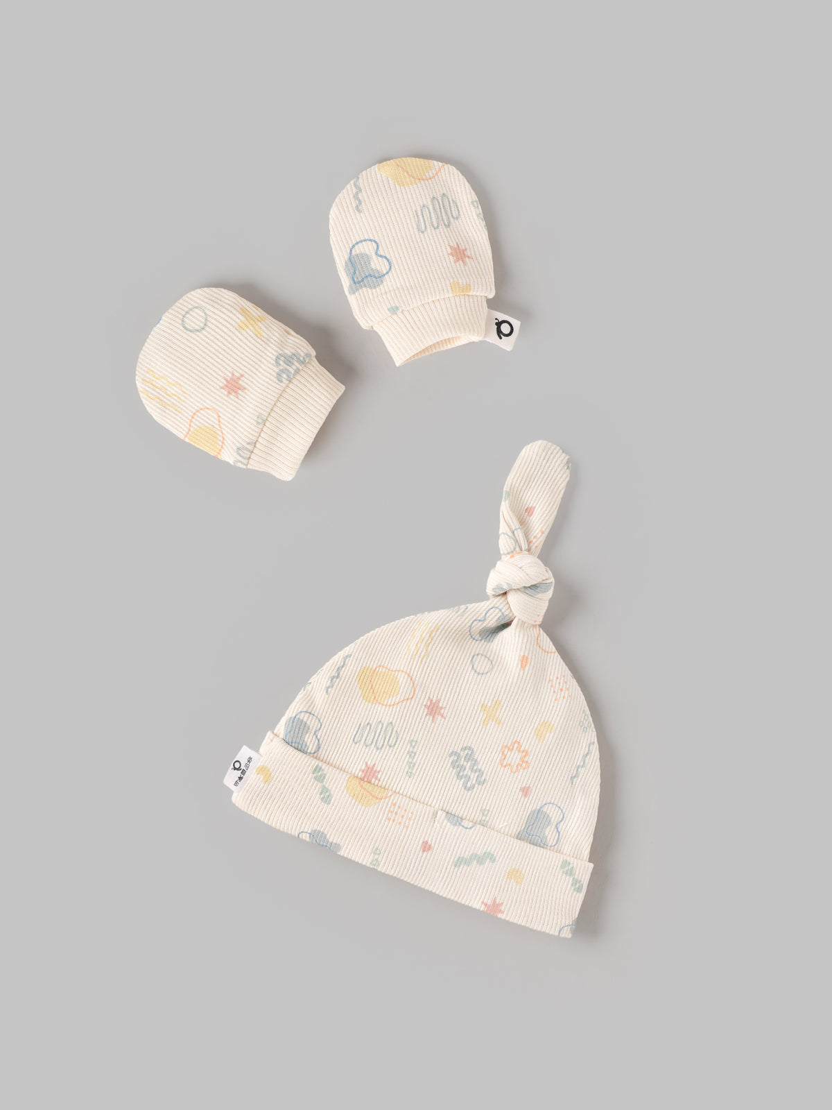 Popees Baby Unisex Cream Ribbed Sleepsuit Set with Rainbow Print, Matching Knotted Cap & Mittens | 0-6 Months