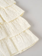 Popees Baby Girls Layered Ruffle Dress with Bow Straps – Off White|3 To 24 Months