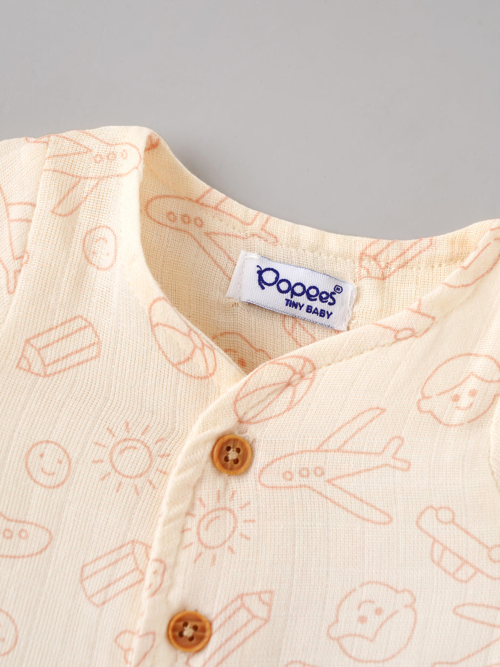 Popees Tiny Baby Printed Muslin Wrap Style Half Sleeve Jhabla for Boys | Soft Breathable Cotton Front Button Top | Cream Multi Print | 0–6 Months