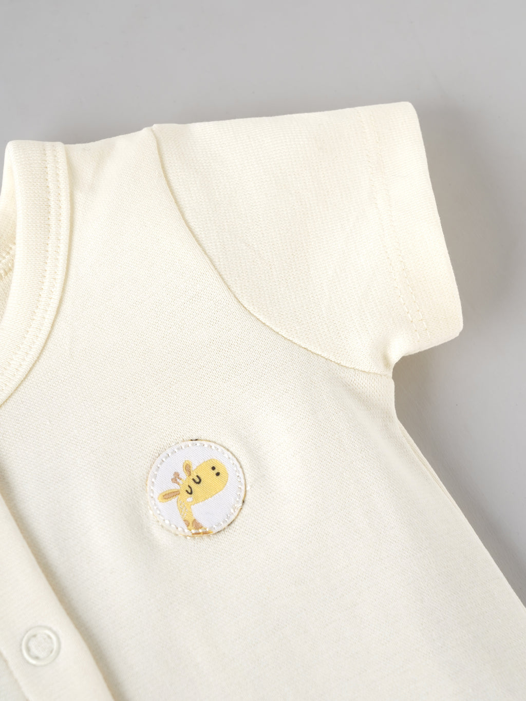 Popees Baby Girls Solid Half Sleeve Romper | Soft Cotton Front Open Snap Button Onesie with Cute Giraffe Patch | Cream | 0–6 Months