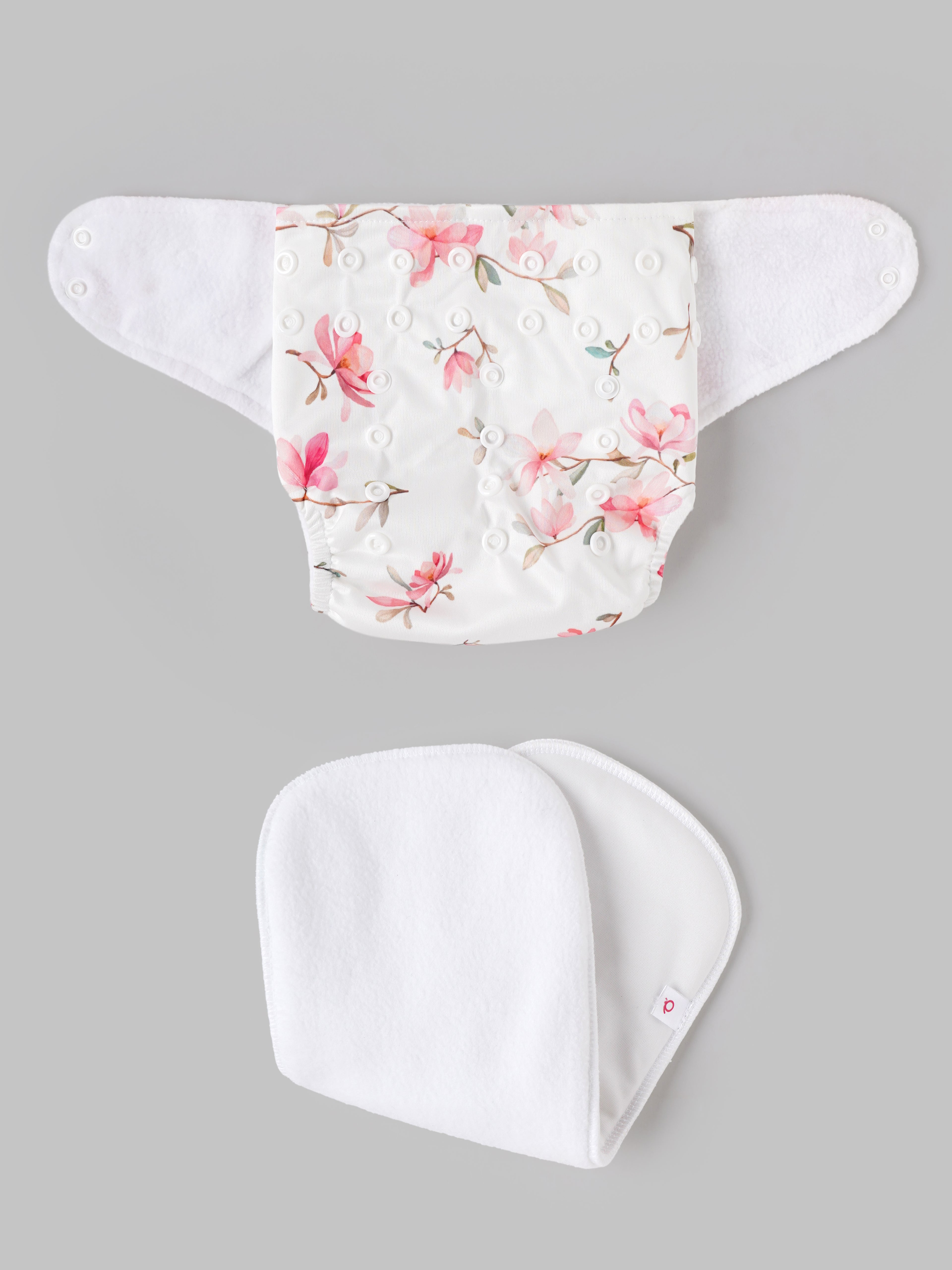 Popees Baby Reusable Cloth Diaper | Adjustable Snap Closure | Floral Print | Newborn (color may vary depending on availability)