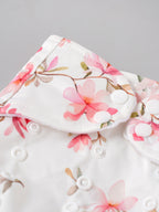Popees Baby Reusable Cloth Diaper | Adjustable Snap Closure | Floral Print | Newborn (color may vary depending on availability)