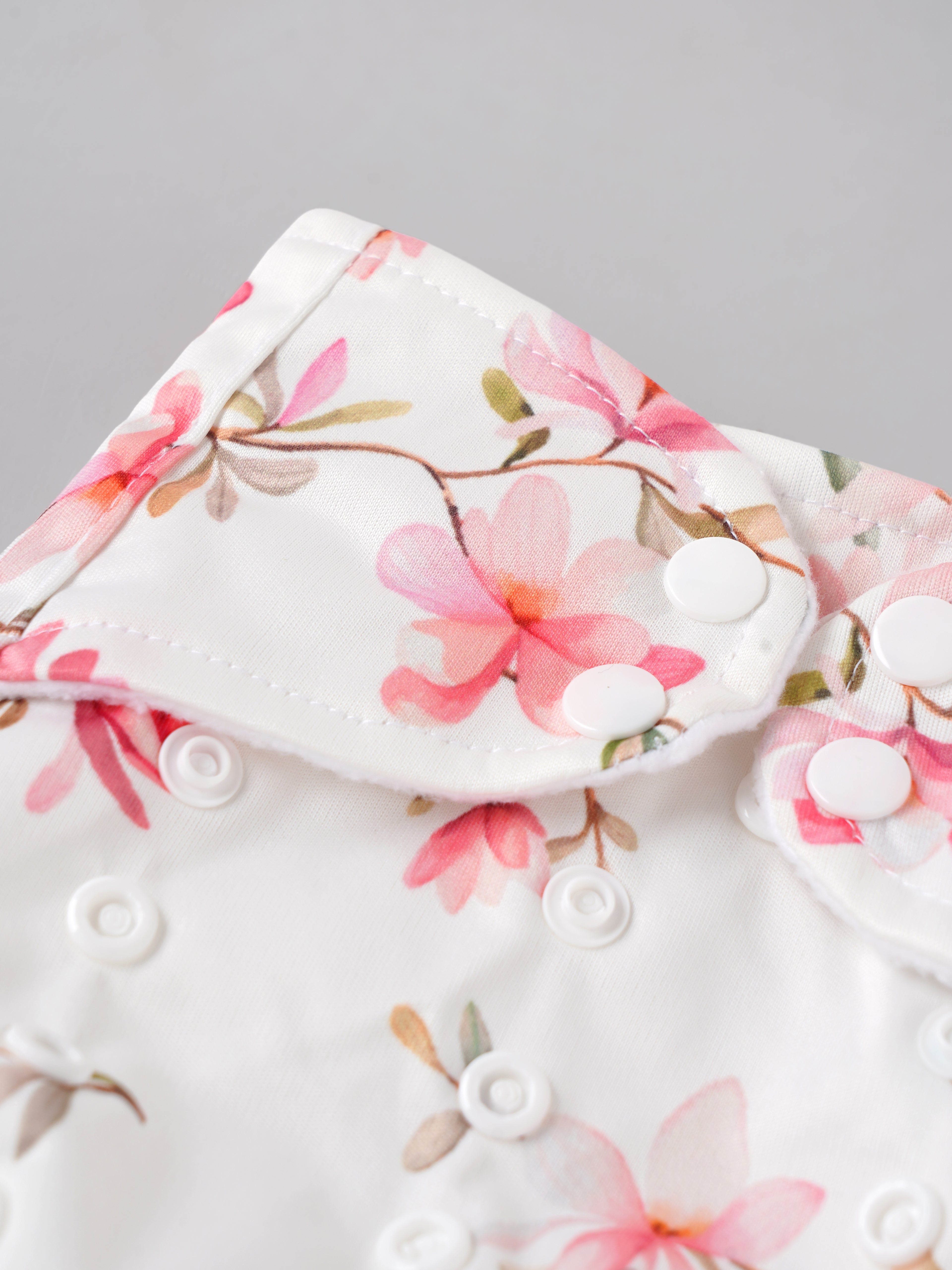 Popees Baby Reusable Cloth Diaper | Adjustable Snap Closure | Floral Print | Newborn (color may vary depending on availability)