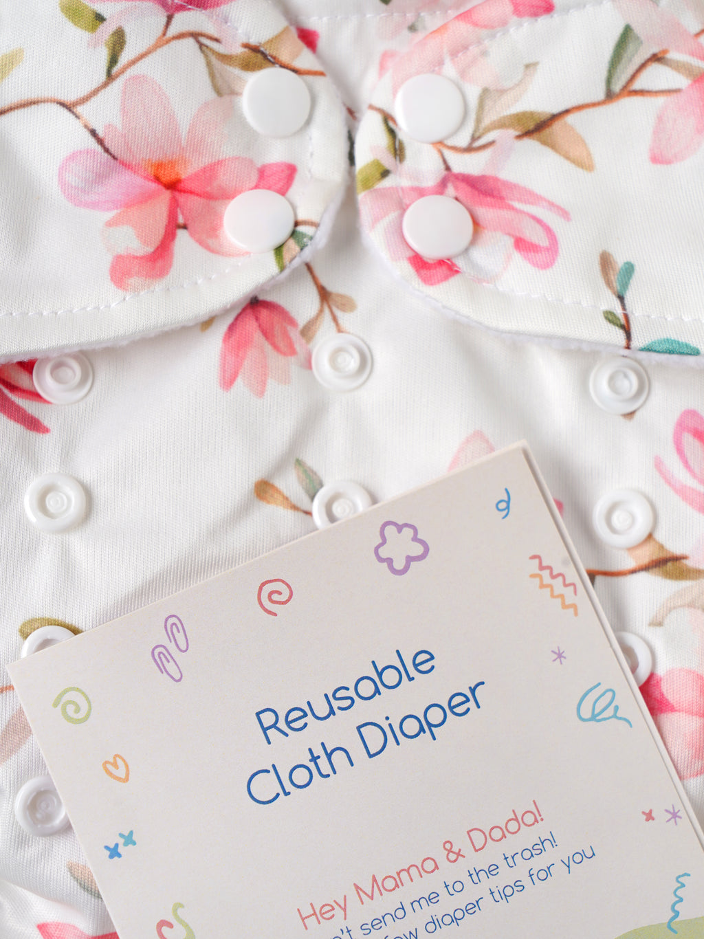 Popees Baby Reusable Cloth Diaper | Adjustable Snap Closure | Floral Print | Newborn (color may vary depending on availability)