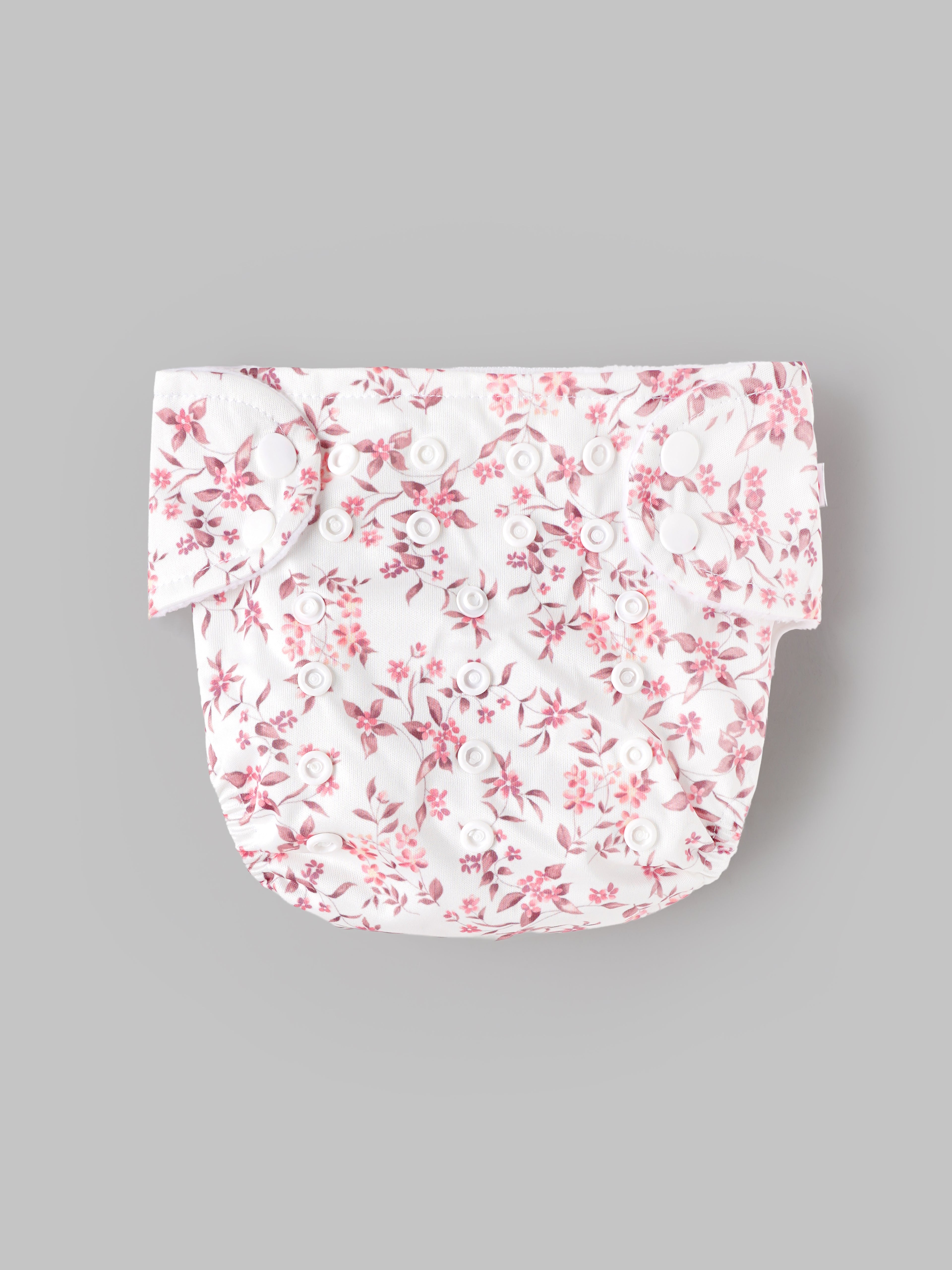 Popees Baby Reusable Cloth Diaper | Adjustable Snap Closure | Floral Print | Newborn (color may vary depending on availability)